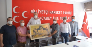 Başkan Özkan'dan MHP ilçe teşkilatına ziyaret